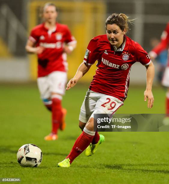 Nicole Rolser of Bayern Muenchen controls the ball during the Women's DFB Cup Quarter Final match between FC Bayern Muenchen and VfL Wolfsburg at the...