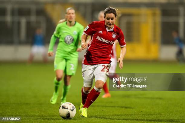 Nicole Rolser of Bayern Muenchen controls the ball during the Women's DFB Cup Quarter Final match between FC Bayern Muenchen and VfL Wolfsburg at the...