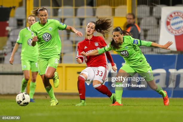 Sara Daebritz of Bayern Muenchen and Sara Bjoerk Gunnarsdottir of Wolfsburg battle for the ball during the Women's DFB Cup Quarter Final match...