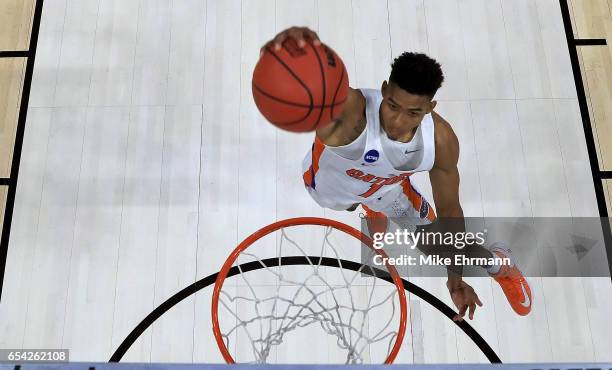 Devin Robinson of the Florida Gators dunks the ball against the East Tennessee State Buccaneers during the first round of the 2017 NCAA Men's...