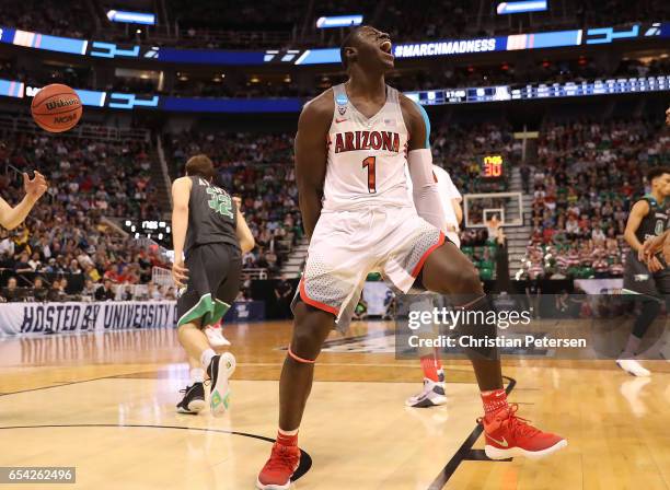 Rawle Alkins of the Arizona Wildcats reacts after dunkins the ball against the North Dakota Fighting Sioux during the first round of the 2017 NCAA...