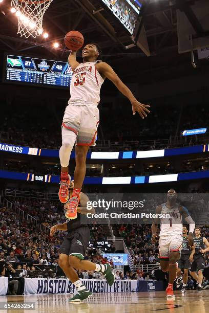 Allonzo Trier of the Arizona Wildcats dunks the ball against the North Dakota Fighting Sioux during the first round of the 2017 NCAA Men's Basketball...