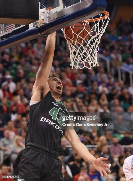Drick Bernstine of the North Dakota Fighting Sioux dunks the ball against the Arizona Wildcats during the first round of the 2017 NCAA Men's...