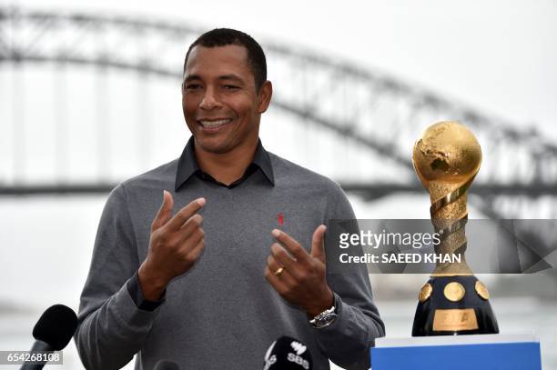 Former Brazilian football player Gilberto Silva talks to the media after posing for photos with the 2017 FIFA Confederations Cup at Blues Point...