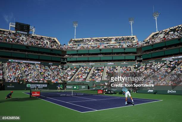 Tennis player Novak Djokovic serving on stadium one during a match against Nick Kyrgios , on March 15 during the BNP Paribas Open tournament played...