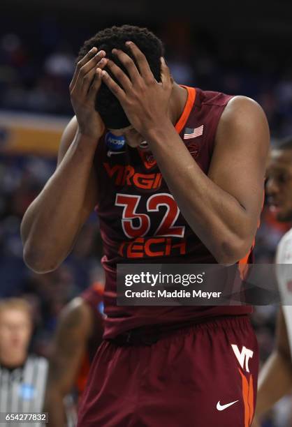 Zach LeDay of the Virginia Tech Hokies reacts as he fouls out of the game in the second half against the Wisconsin Badgers during the first round of...