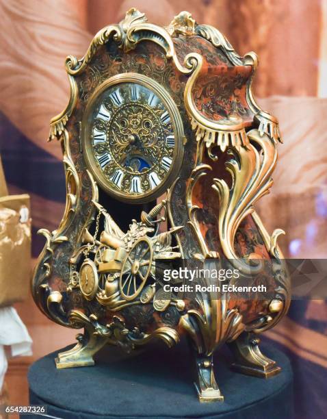 Cogsworth" movie prop on display at opening night of Disney's "Beauty And The Beast" at El Capitan Theatre on March 16, 2017 in Los Angeles,...