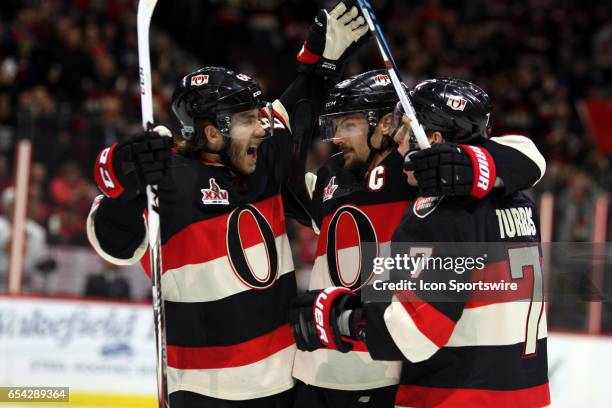 Ottawa Senators Defenceman Erik Karlsson celebrates a goal with Ottawa Senators Center Kyle Turris and Ottawa Senators Left Wing Mike Hoffman in the...