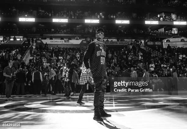 Rapper Quavo of Migos performs in a post game concert after Memphis Grizzles Vs Atlanta Hawks Game at Phillips Arena on March 16, 2017 in Atlanta,...