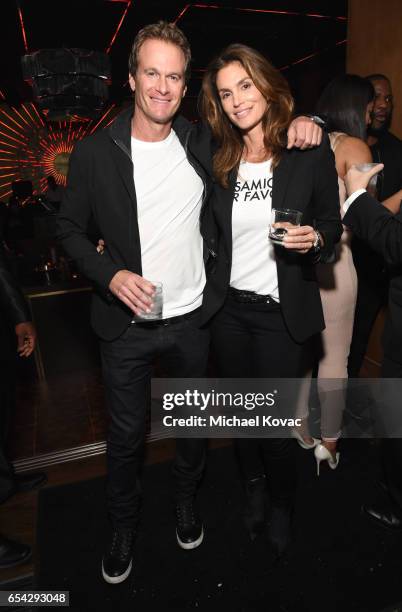 Rande Gerber and model Cindy Crawford attends day one of TAO, Beauty + Essex, Avenue + Luchini LA Grand Opening on March 16, 2017 in Los Angeles,...