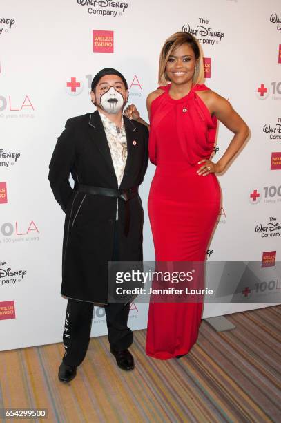 Stylist Runningbear Ramirez and guest attend the American Red Cross Centennial Celebration to Honor Disney as the "Humanitarian Company of The Year"...