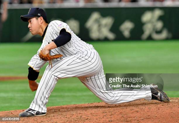 Pitcher Kazuhisa Makita of Japan throws in the top of the ninth inning during the World Baseball Classic Pool E Game Four between Cuba and Japan at...