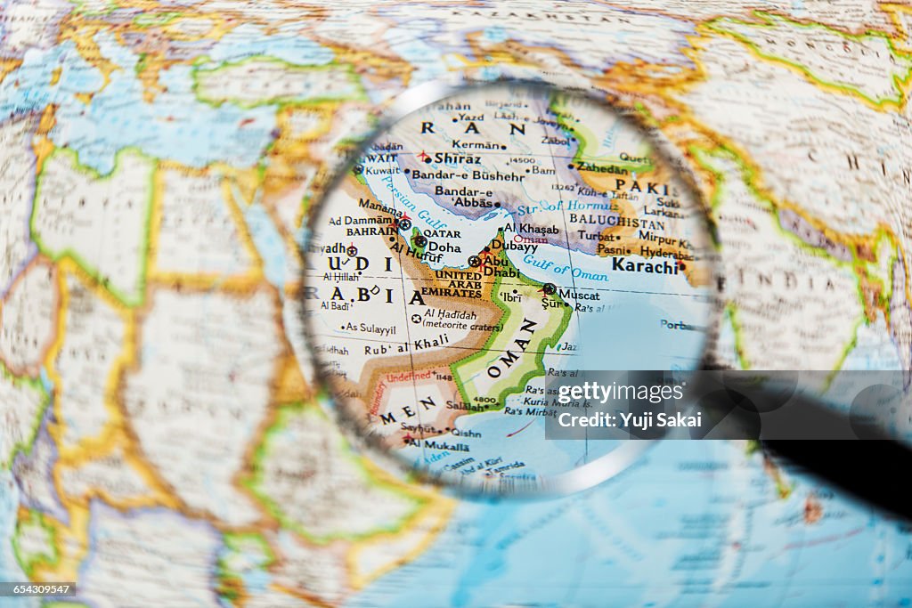 OMAN ,  UNITED ARAB EMIRATES  and Magnifying glass