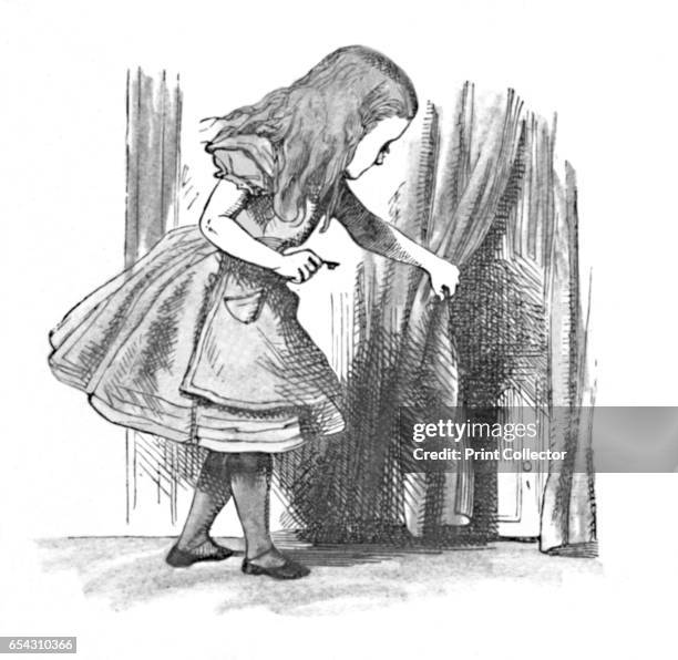 Alice looking at a small door behind a curtain, 1889. Lewis Carrolls Alice in Wonderland as illustrated by John Tenniel . From Alices Adventures in...