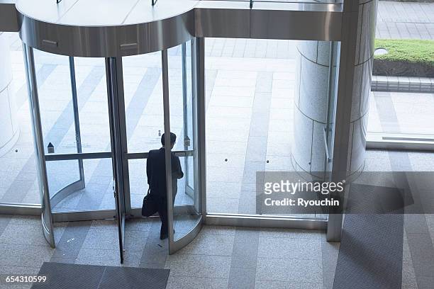 business life, businessman, people who work - entrance building people stock pictures, royalty-free photos & images