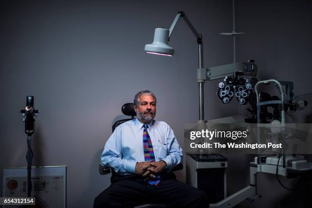Serge Martin, O.D. A doctor of optometry and Trump supporter sits for a portrait in an exam room in Murfreesboro, Tenn. On Thursday, March. 16, 2017....
