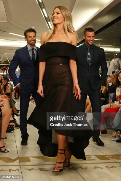 Tim Robards , Jennifer Hawkins and Kris Smith showcase designs during the Myer Fashion Runway show on March 17, 2017 in Melbourne, Australia.