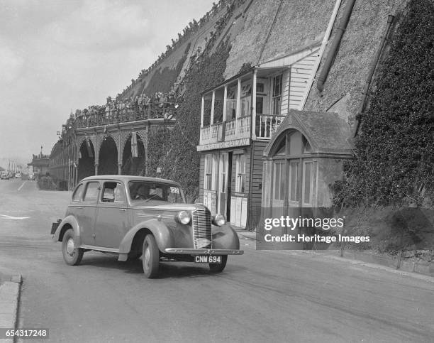 Vauxhall 14-6 of GL Boughton competing in the RAC Rally, Madeira Drive, Brighton, 1939. Artist: Bill Brunell. Vauxhall Fourteen-Six 1781 cc. Reg. No....