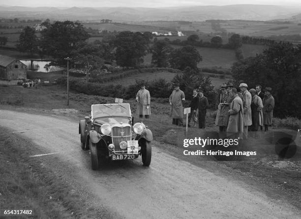 Singer B37 1.5 litre sports of Alf Langley competing in the South Wales Auto Club Welsh Rally, 1937 Artist: Bill Brunell. Singer B37 1.5 litre...