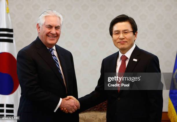 Secretary of State Rex Tillerson shakes hands with acting South Korean President and Prime Minister Hwang Kyo-ahn prior to their meeting at the...