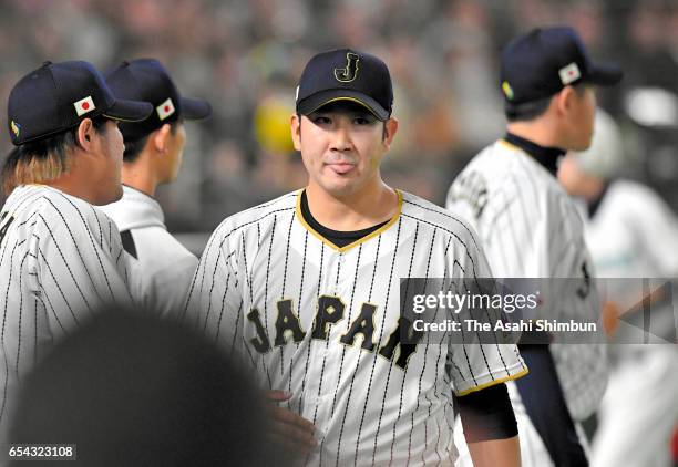 Pitcher Tomoyuki Sugano of Japan reacts after the top of fifth inning during the World Baseball Classic Pool E Game Four between Cuba and Japan at...