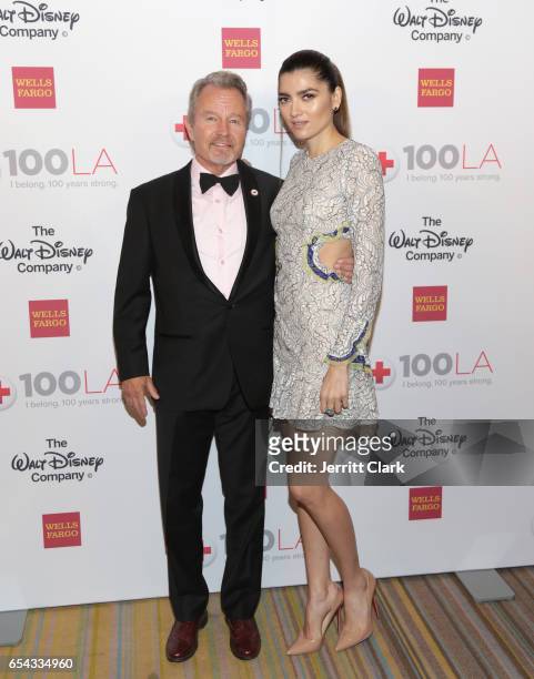 John Savage and Blanca Blanco attend the American Red Cross Centennial Celebration To Honor Disney As "Humanitarian Company Of The Year" at the...