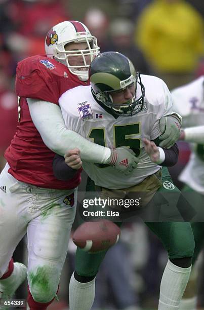 Quarterback Matt Newton of Colorado State is sacked by Donovan Arp of Louisville at the Liberty Bowl in Memphis, Tennessee. Colorado State beat...