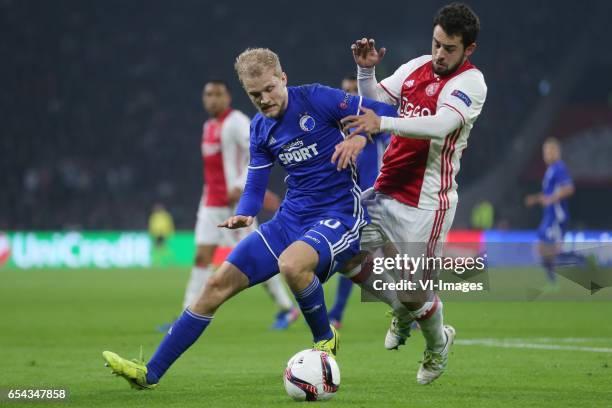 Nicolai Boilesen of FC Kopenhagen, Amin Younes of Ajaxduring the UEFA Europa League round of 32 match between Ajax Amsterdam and FC Copenhagen at the...