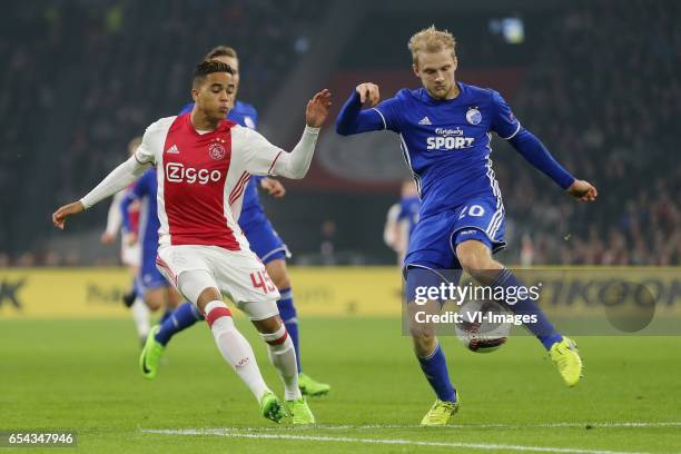 Justin Kluivert of Ajax, Nicolai Boilesen of FC Kopenhagenduring the UEFA Europa League round of 32 match between Ajax Amsterdam and FC Copenhagen at...