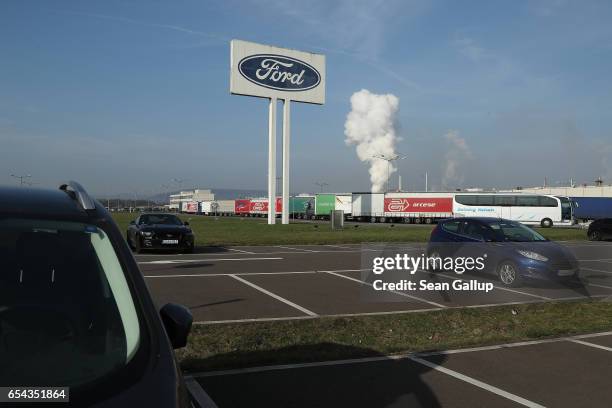 Sign with the Ford company logo stands outside the Ford car factory on March 15, 2017 in Saarlouis, Germany. Saarlouis is in the industrial heartland...