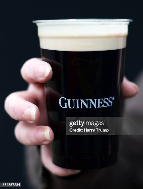 Detailed view of a pint of Guinness during Gold Cup Day of the Cheltenham Festival at Cheltenham Racecourse on March 17, 2017 in Cheltenham, England.