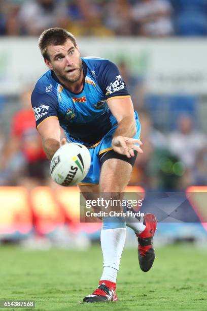 Ryan Simpkins of the Titans passes during the round three NRL match between the Gold Coast Titans and the Parramatta Eels at Cbus Super Stadium on...