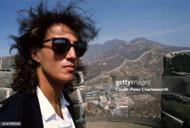 Andrew Ridgeley, of the pop group Wham visits the Great Wall as he promotes the first-ever gig by a Western pop band in communist China. Wham played...