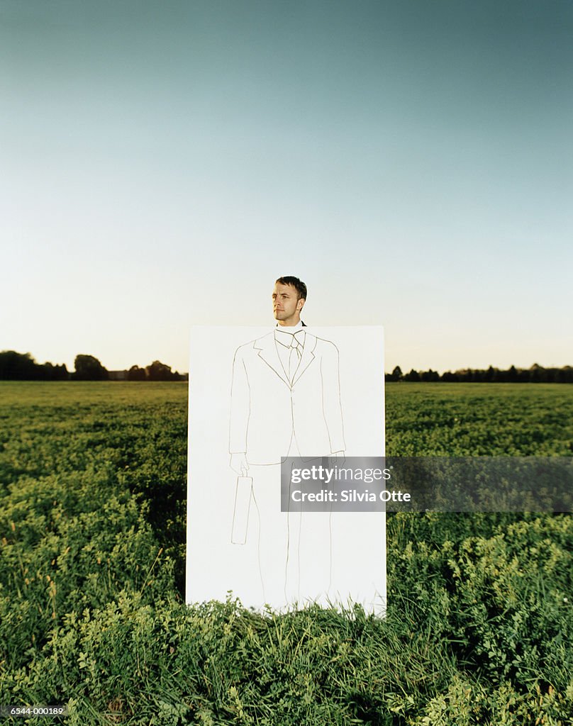 Man Behind Cardboard Suit