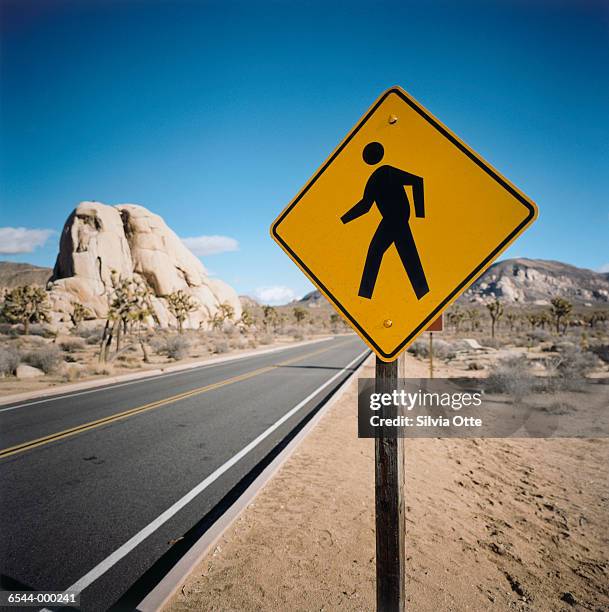 crosswalk sign in desert - stakes in the sand stock pictures, royalty-free photos & images