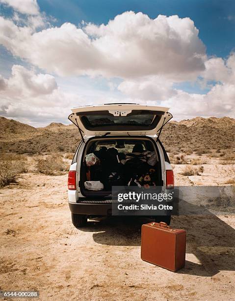 suitcase and automobile - empty car boot stock pictures, royalty-free photos & images