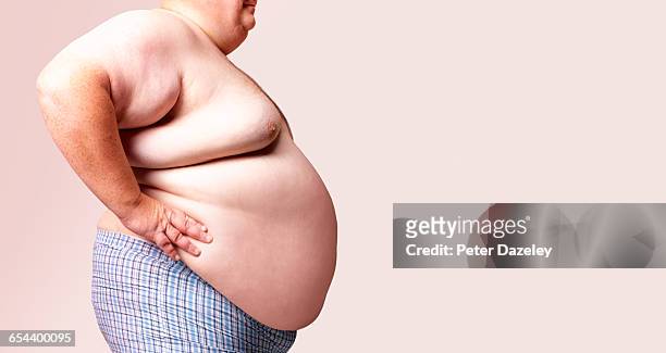 shirtless obese man with copy space - fat people stock pictures, royalty-free photos & images