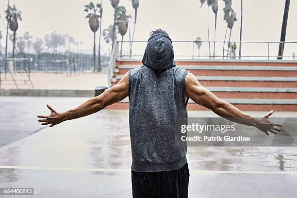 rainy day workout - wet sweatshirt stock-fotos und bilder