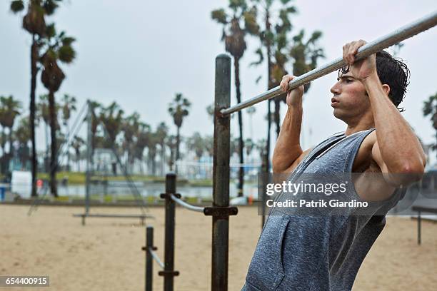 rainy day workout - chin ups stock pictures, royalty-free photos & images