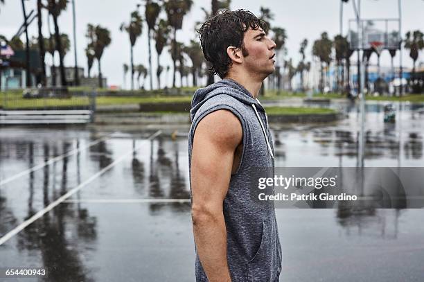 rainy day workout - wet sweatshirt stock-fotos und bilder