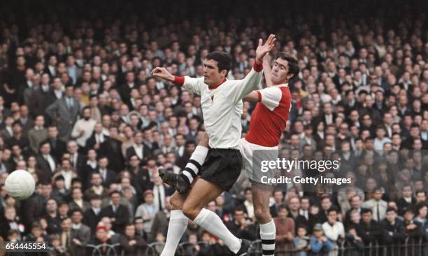 Arsenal forward Bobby Gould challenges Liverpool defender Ron Yeats during a First Divsion match which ended 1-1 at Highbury on August 17, 1968 in...