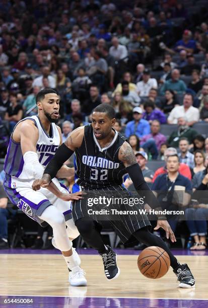 Watson of the Orlando Magic drives towards the basket on Garrett Temple of the Sacramento Kings during an NBA basketball game at Golden 1 Center on...