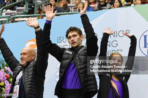 Ekaterina Alexandrovskaya and Harley Windsor of Australia celebrate at kiss and cry during the 3rd day of the World Junior Figure Skating...