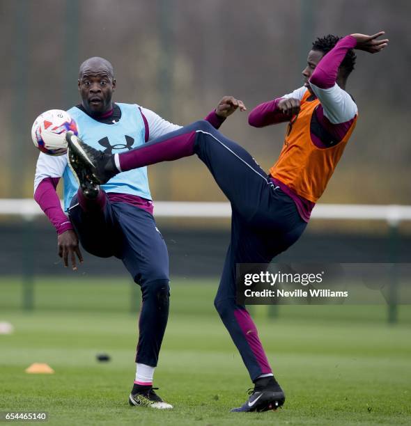Keinan Davis of Aston Villa in action with team mate Chris Samba during a training session at the club's training ground at Bodymoor Heath on March...