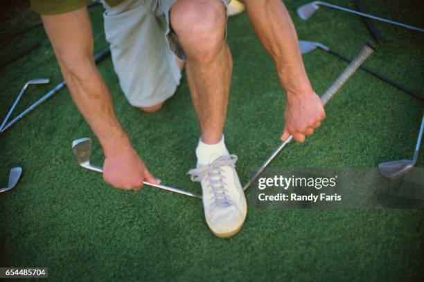 man breaking golf club - broken golf club stock pictures, royalty-free photos & images