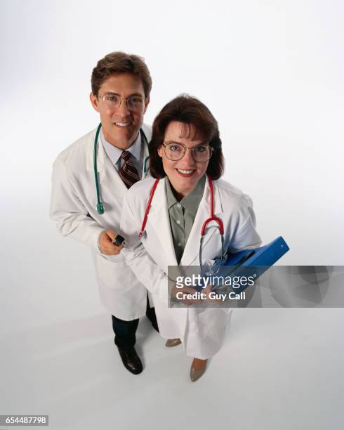 friendly doctors - cali morales stock pictures, royalty-free photos & images