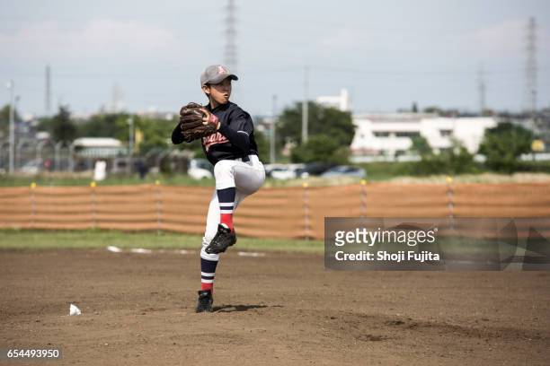 youth baseball players, pitcher - kid baseball pitcher stock pictures, royalty-free photos & images