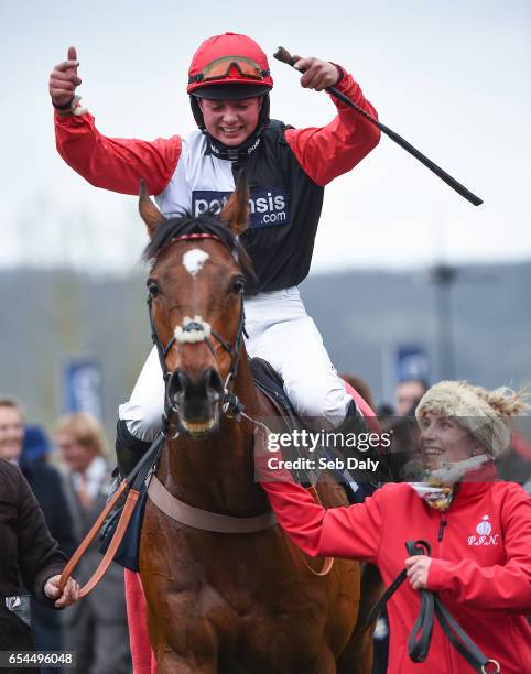 Cheltenham , United Kingdom - 17 March 2017; Jockey Bryony Frost celebrates as she enters the winners enclosure after winning the St James's Place...