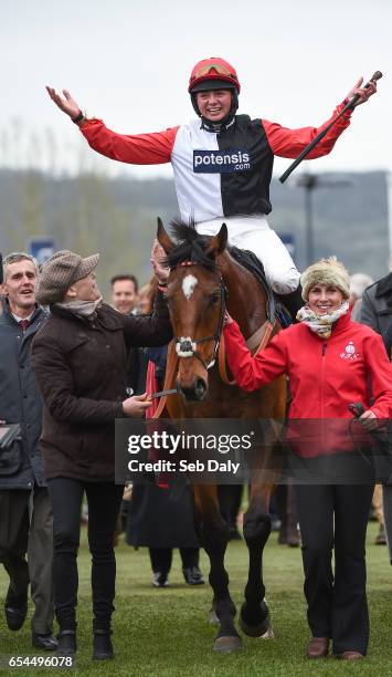 Cheltenham , United Kingdom - 17 March 2017; Jockey Bryony Frost celebrates as she enters the winners enclosure after winning the St James's Place...