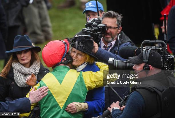 Cheltenham , United Kingdom - 17 March 2017; Trainer Jessica Harrington hugs jockey Robbie Power after winning the Timico Cheltenham Gold Cup Steeple...